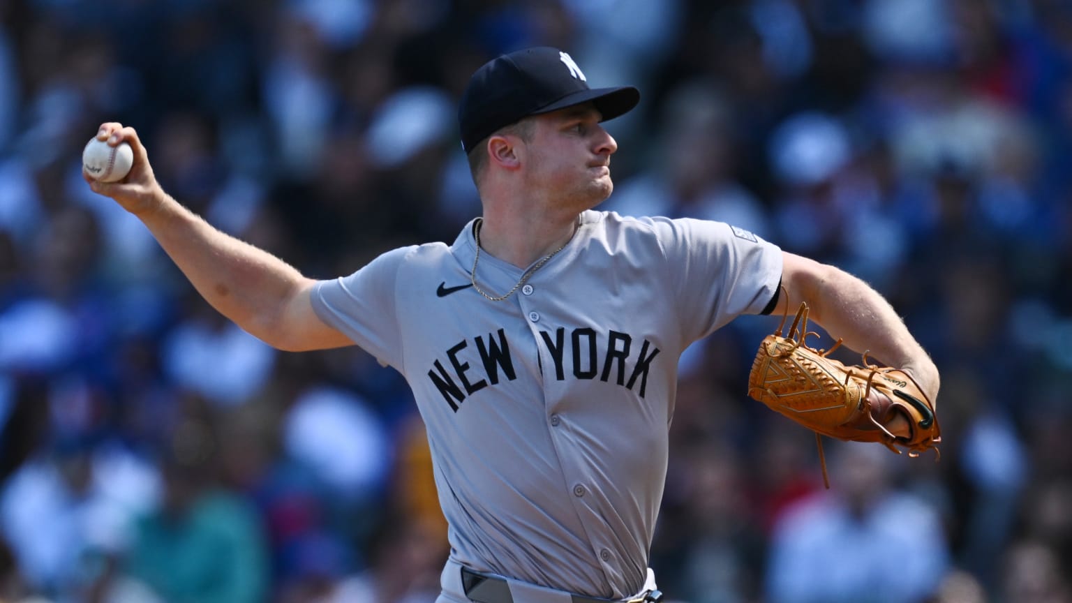 Clark Schmidt pitching at Yankee Stadium for Yankees vs A's