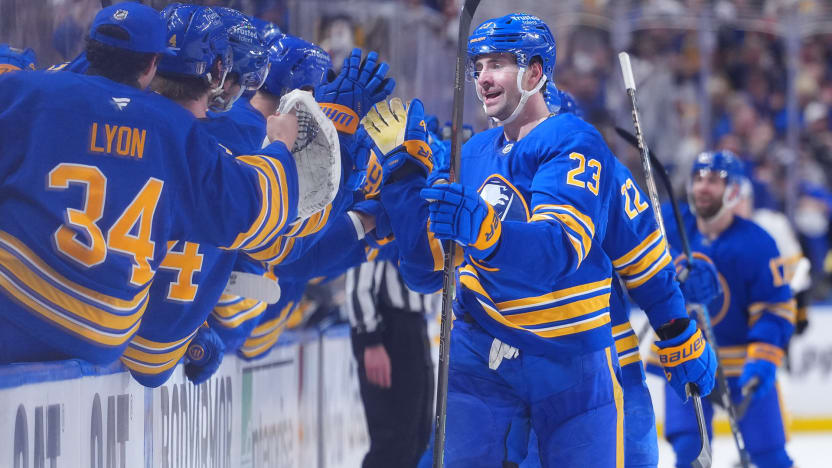 Buffalo Sabres forward Sam Lafferty celebrating a goal at the bench in the 2026 Stanley Cup Playoffs first round series against the Boston Bruins at KeyBank Center